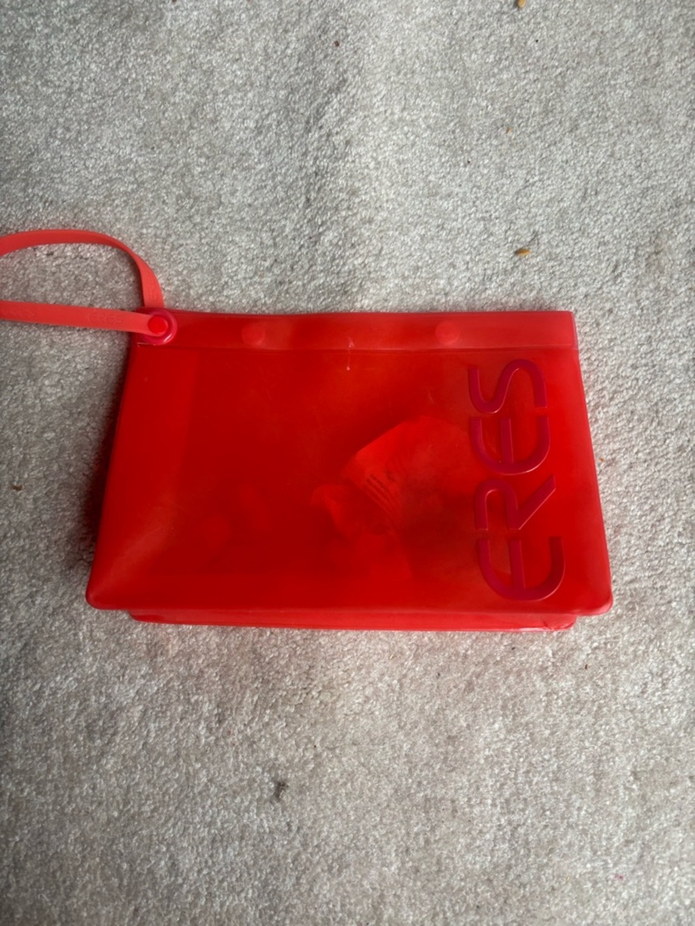 Orange Eres Mini Wristlet Bag with Bold Script Branding